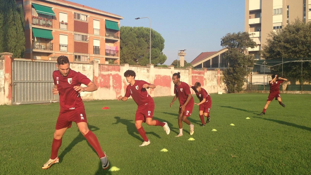 Il Fano Calcio in allenamento. Da sinistra: Luca Palazzi, Tullio Riggioni, Filmon Incerti