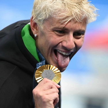 Perché i nuotatori alle Olimpiadi hanno il piumino: la spiegazione