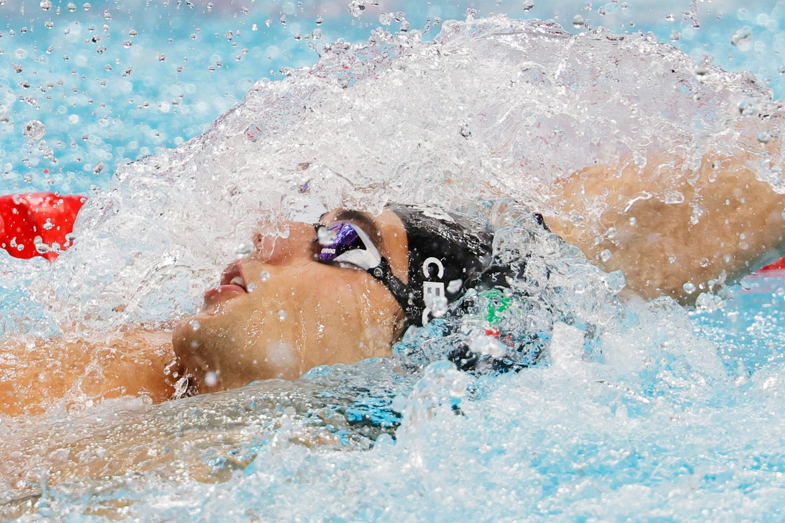 Thomas Ceccon in azione alle Olimpiadi